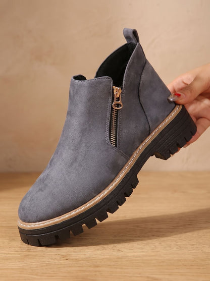 Homixa women's side-zip ankle boots with low block heel, cushioned insole, and treaded sole, perfect for casual or stylish wear.