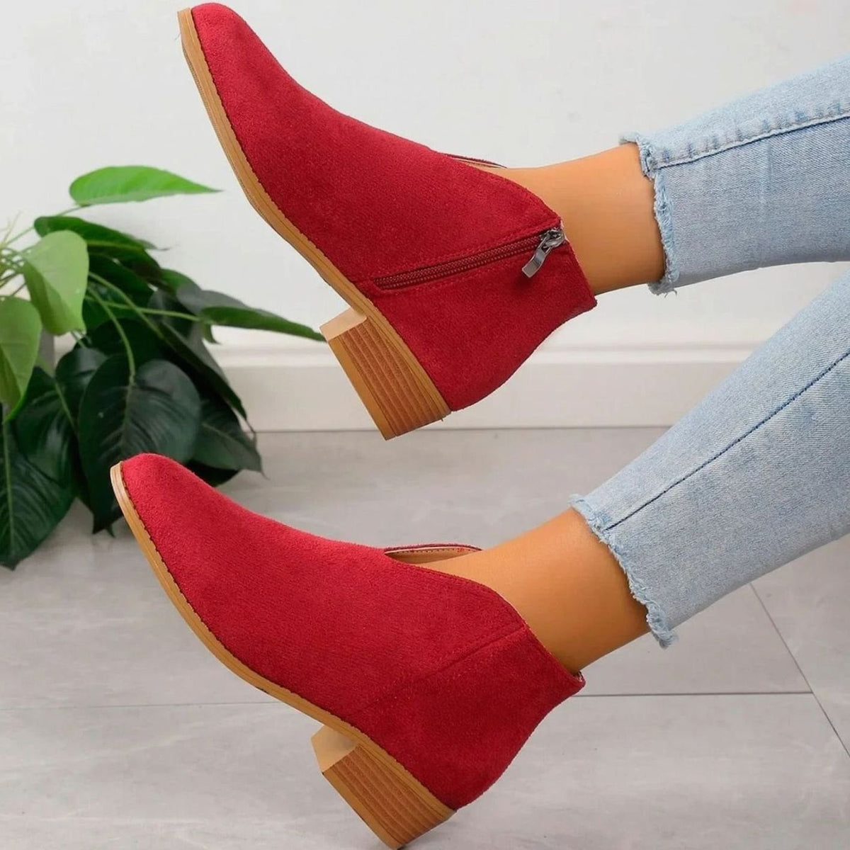 Homixa women's ankle boots with side zipper, pointed toe, block heel, and V-cut ankle shaft, stylish and modern footwear.