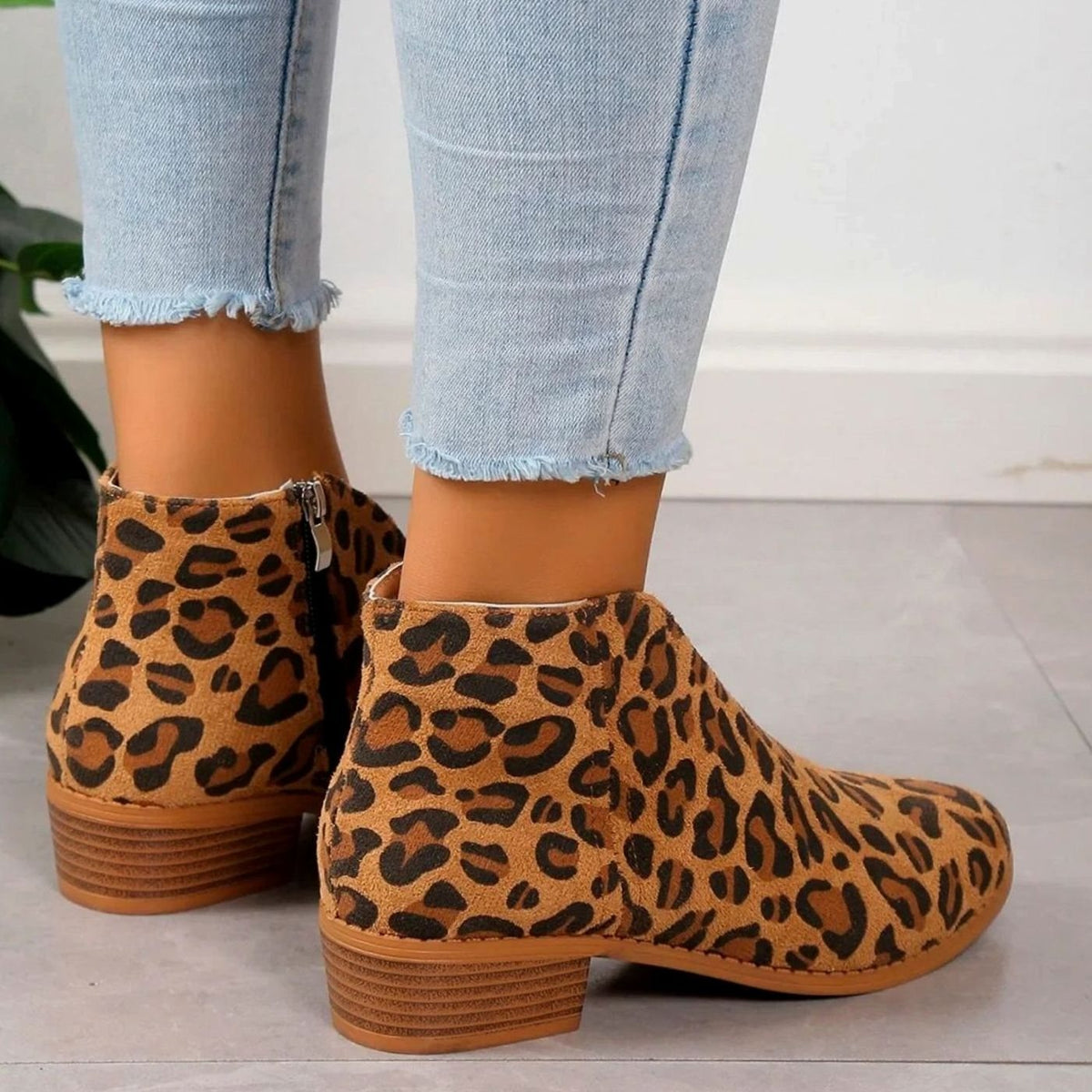 Homixa women's pointed-toe ankle booties with side zipper, block heel, and V-cut ankle shaft, stylish and modern footwear.