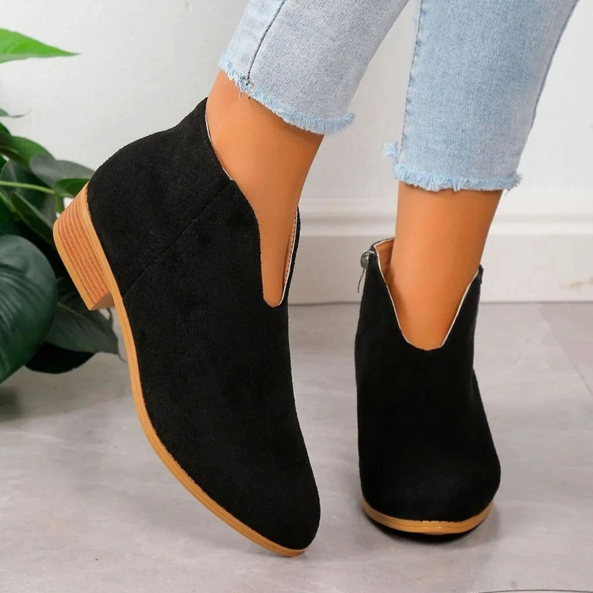 Homixa women's pointed-toe ankle booties with side zip, block heel, and V-cut ankle shaft, stylish and modern footwear.