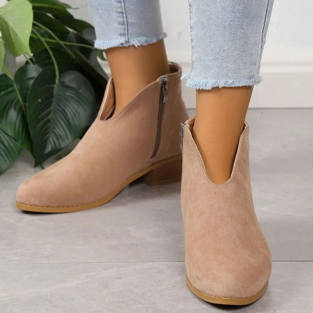 Homixa women's ankle boots with pointed toes, side zipper, V-cut ankle shaft, and block heel.