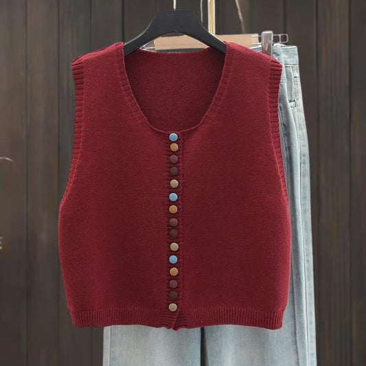 Women's sleeveless knit vest with multicolored buttons and crew neck, by Homixa, featuring a stylish button-front design.