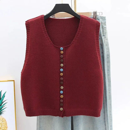 Women's sleeveless knit vest with multicolored button front and crew neck, stylish Homixa button-front knit top.