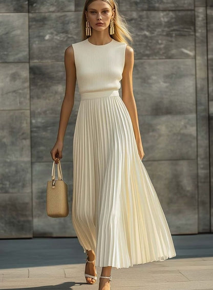 Women’s sleeveless maxi dress by Homixa featuring a ribbed-knit bodice and flowing pleated skirt, perfect for elegant summer wear.