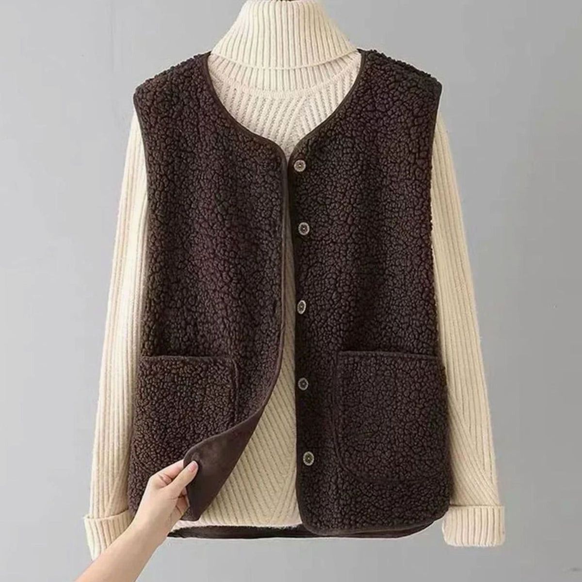 Women's sleeveless Teddy Fleece vest with V-neck, button front, and two pockets by Homixa, shown in soft fleece fabric.