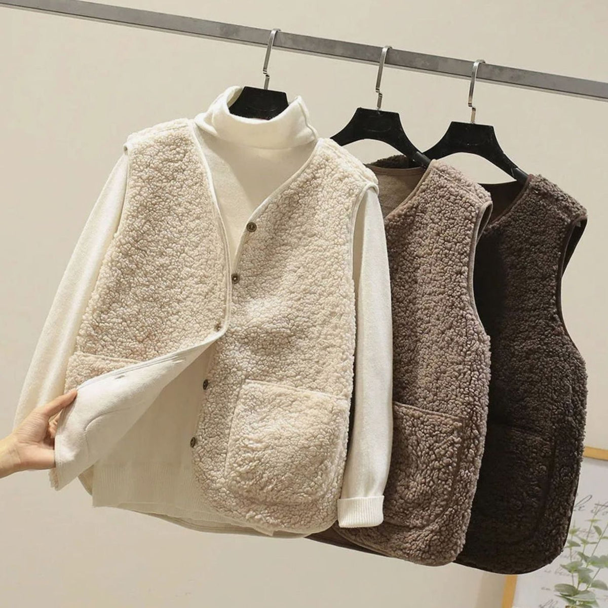 Women's sleeveless V-neck Teddy Fleece vest by Homixa with button front and two pockets, soft and cozy for casual wear.