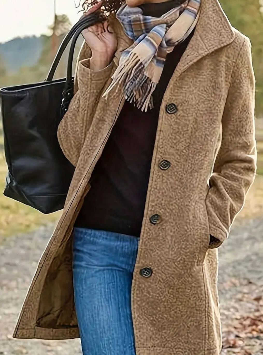Women's slim-cut long wool coat by Homixa featuring a button front and soft-touch finish, perfect for stylish cold-weather wear.
