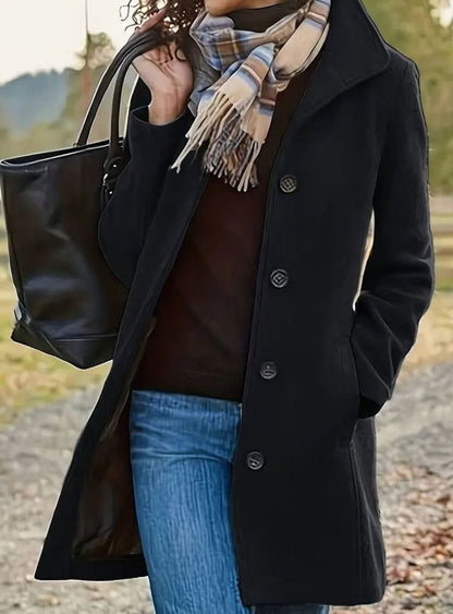 Women's slim-cut long wool coat by Homixa with button front and soft-touch finish, ideal for classic winter style.