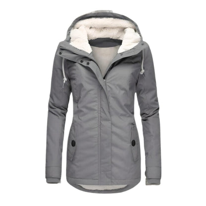 Women's slim-fit water-resistant winter parka by Homixa with sherpa-lined hood and adjustable drawstring for warmth and style.
