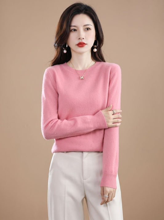 Women's soft cashmere crew-neck sweater with long sleeves and breathable knit, from Homixa, shown on a hanger.