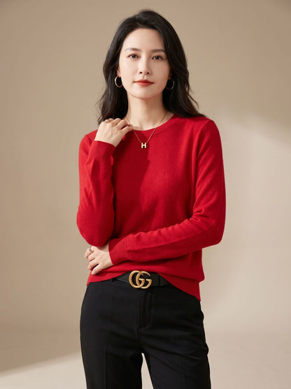 Women's soft cashmere crew-neck sweater with long sleeves and breathable knit, from Homixa, shown on a model.