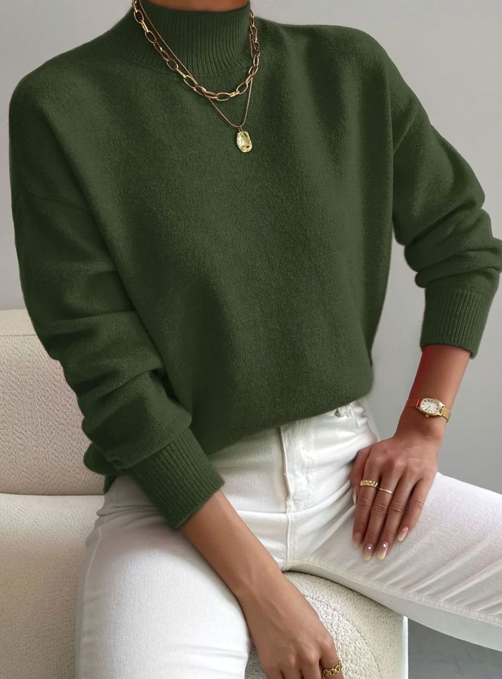 Women's soft ribbed-knit turtleneck sweater by Homixa with long sleeves and stretchy fabric, styled on a model.
