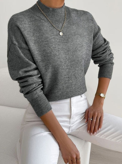Women's soft ribbed-knit turtleneck sweater by Homixa featuring stretch fabric and long sleeves, shown on a mannequin.
