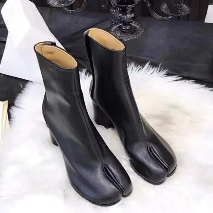Women's split-toe ankle boots by Homixa featuring a low block heel and smooth leather-look finish.