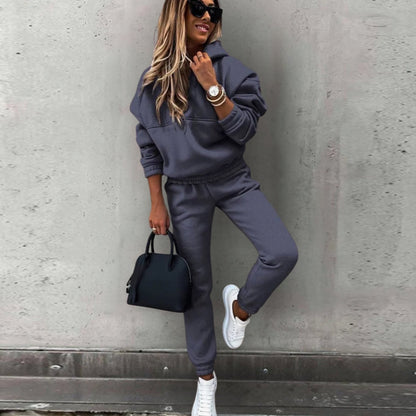 Homixa women's stretch tracksuit set featuring a relaxed hoodie and fitted jogger pants, ideal for casual and active wear.