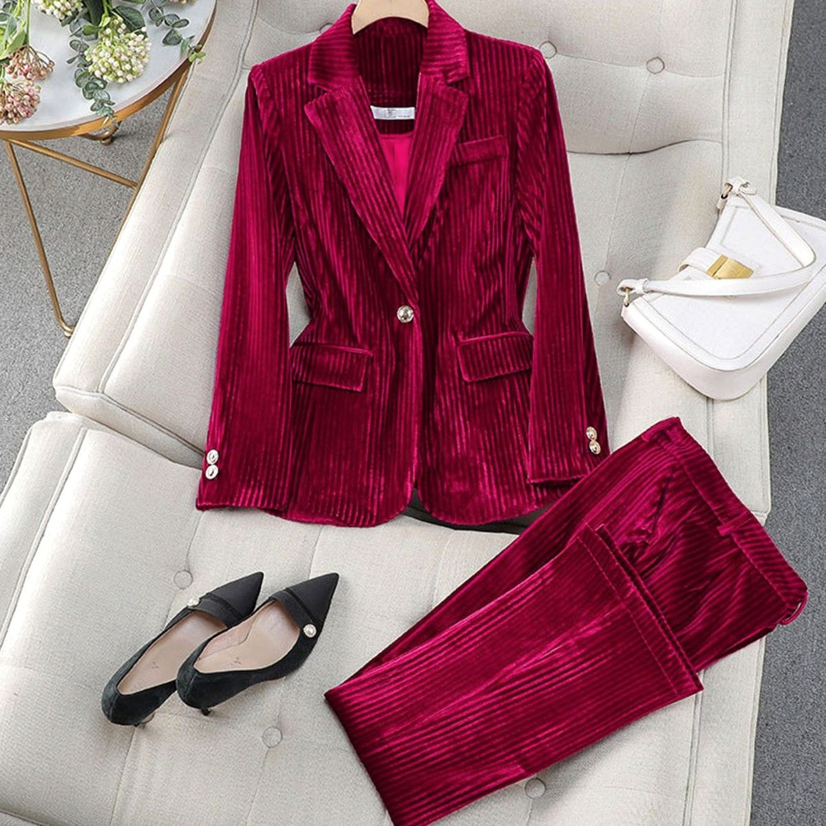 Women's striped velvet pantsuit by Homixa featuring a tailored cut and straight-leg pants, perfect for elegant, modern style.