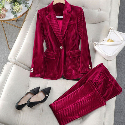 Women's striped velvet pantsuit by Homixa featuring a tailored cut and straight-leg pants, perfect for elegant, modern style.