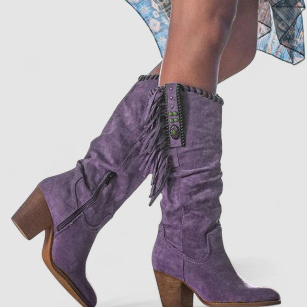 Women's suede knee-high Western boots by Homixa featuring fringe detailing and turquoise concho accents.