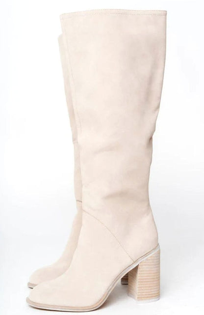 Women's suede-look winter knee-high boots by Homixa with block heel and inner side zipper, designed for warmth and style.
