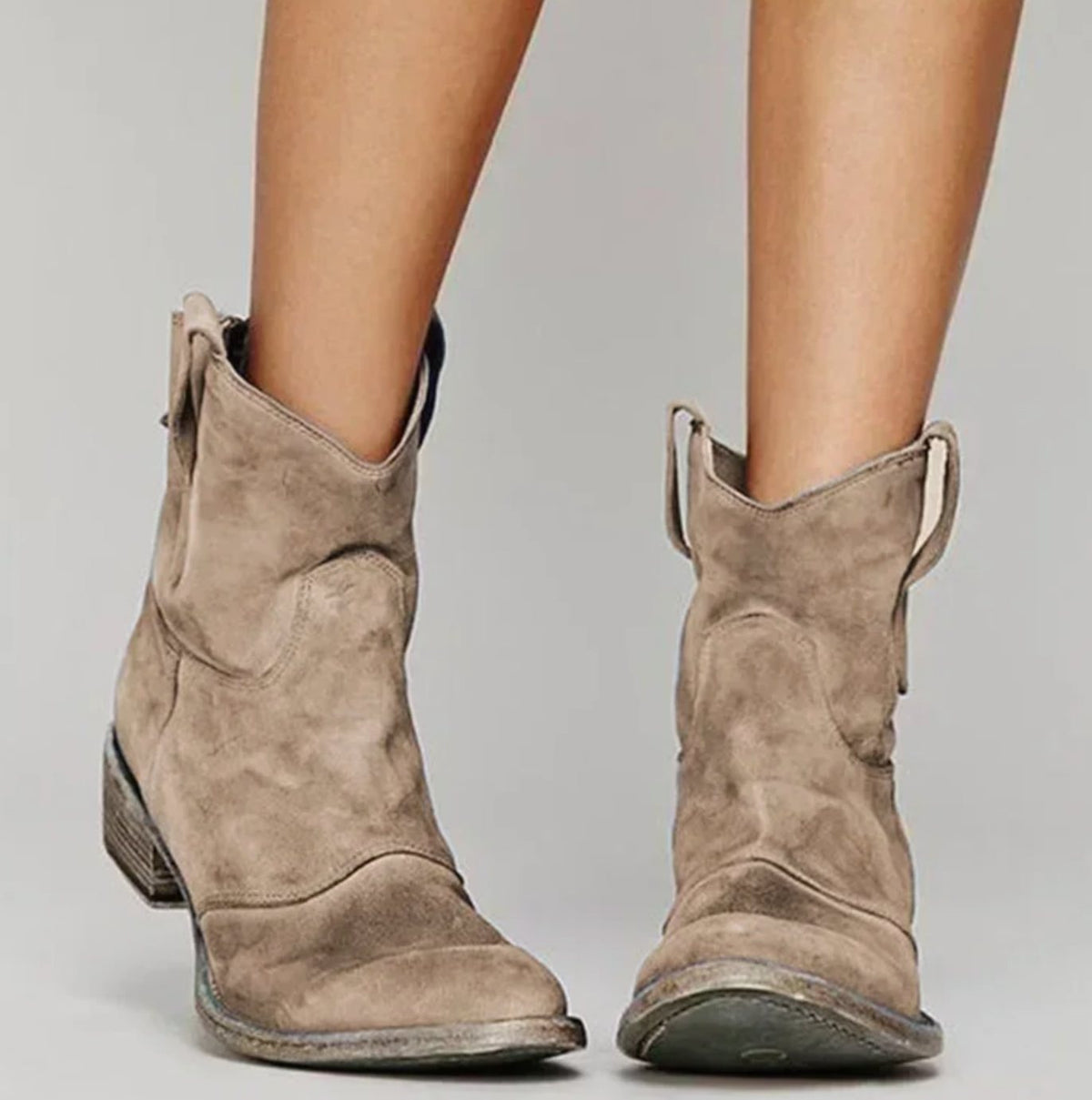 Homixa women's suede western ankle boots with curved stitching, round toe, and low block heel on a white background.