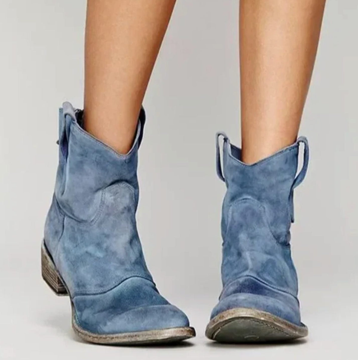 Homixa women's suede western ankle boots with curved stitching, round toe, and low block heel on a neutral background.
