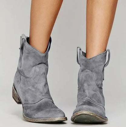 Homixa women's suede western ankle booties with curved stitching, round toe, and low block heel, stylish and comfortable footwear.