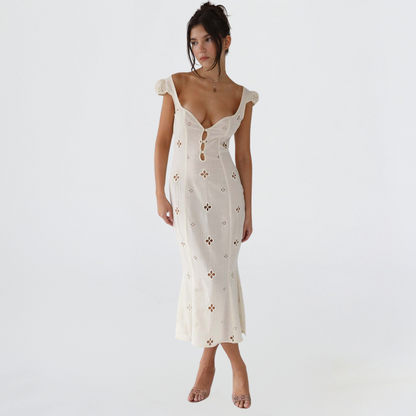 Homixa women's summer midi dress for wedding guests with cutout-inspired pattern, sleeveless and flowy for warm weather occasions.