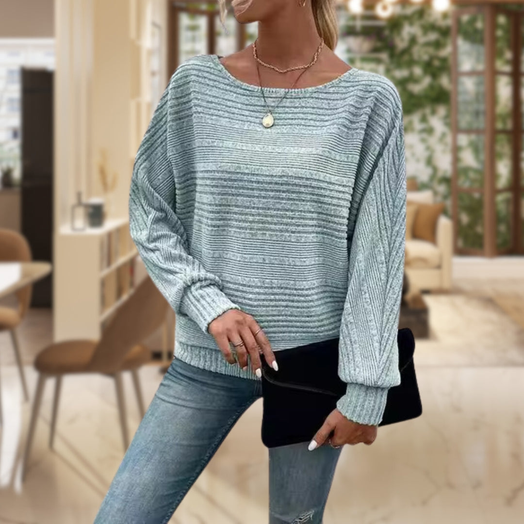 Homixa women's sweater with horizontal ribbing, wide round neckline, and cuffed sleeves, shown on a model.