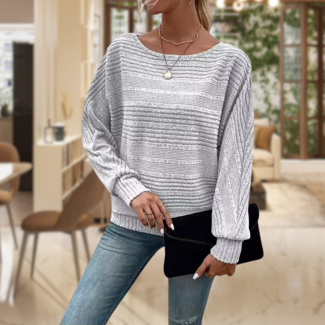 Homixa women's sweater featuring horizontal ribbing, wide round neckline, and cuffed sleeves, displayed on a model.