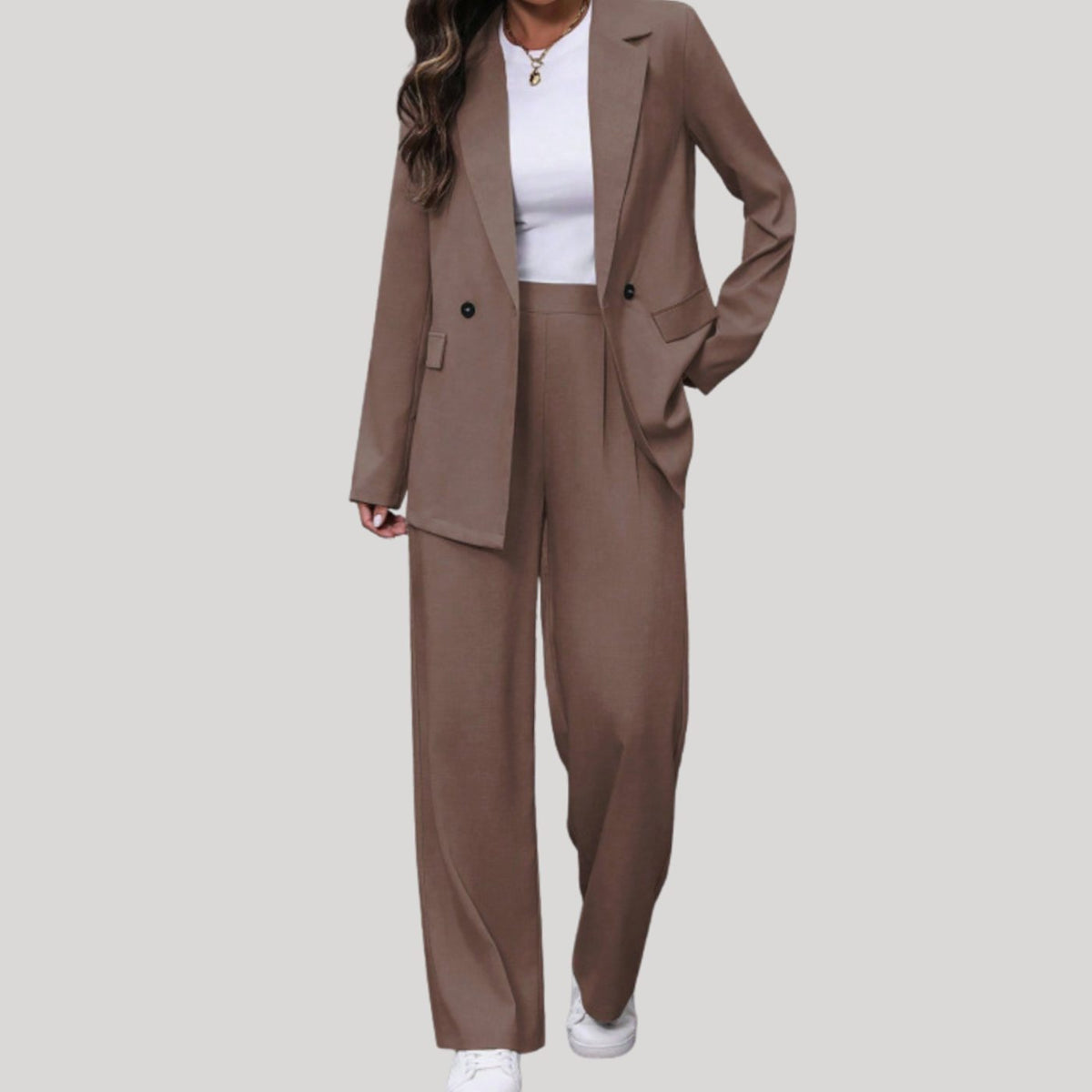 Women's tailored double-breasted suit set by Homixa featuring fitted blazer and wide-leg pants, stylish professional outfit.