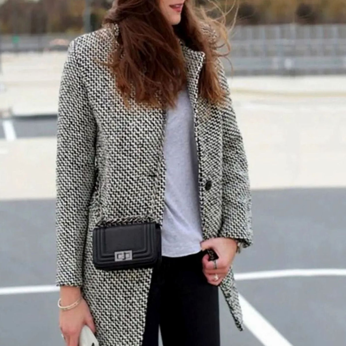 Women’s tailored houndstooth longline coat with structured design, featuring a classic pattern and fitted silhouette by Homixa.