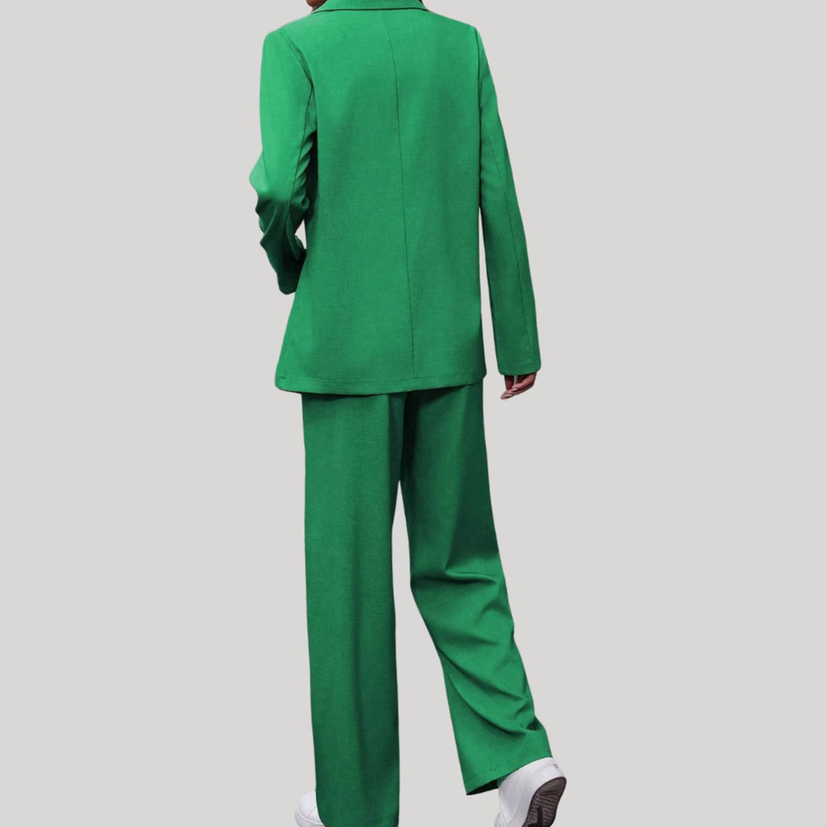 Homixa women's tailored pant suit featuring a double-breasted blazer and pleated wide-leg pants, styled for a professional look.