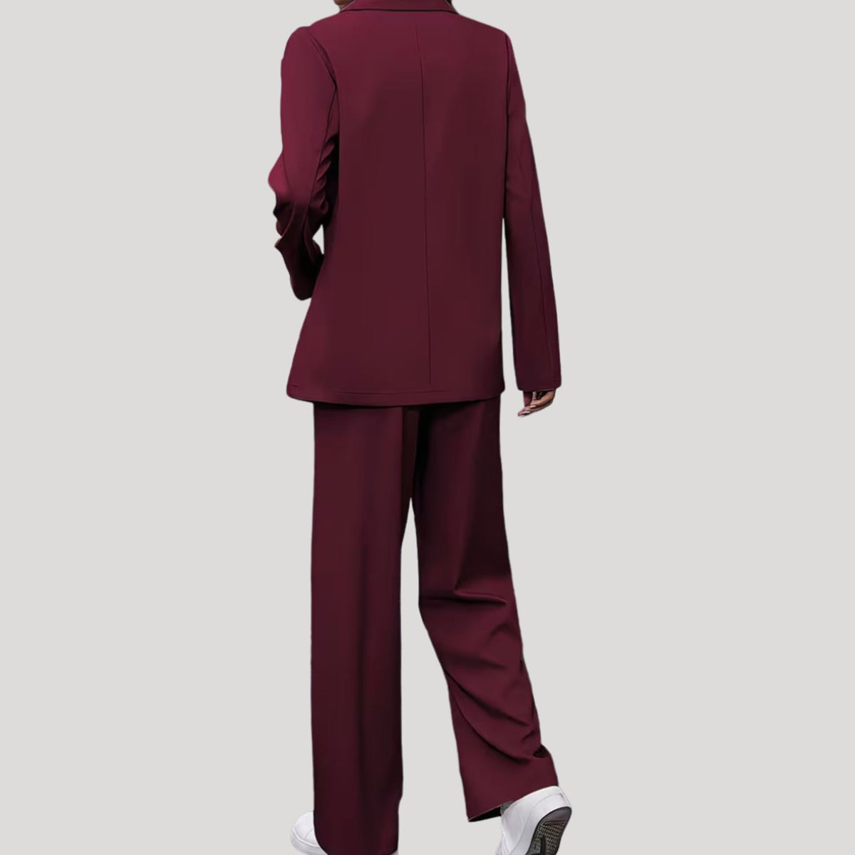 Women's Homixa tailored pant suit featuring a double-breasted blazer and pleated wide-leg pants, stylish and professional.