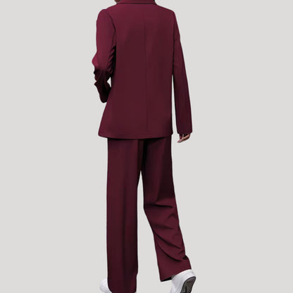 Women's Homixa tailored pant suit featuring a double-breasted blazer and pleated wide-leg pants, stylish and professional.