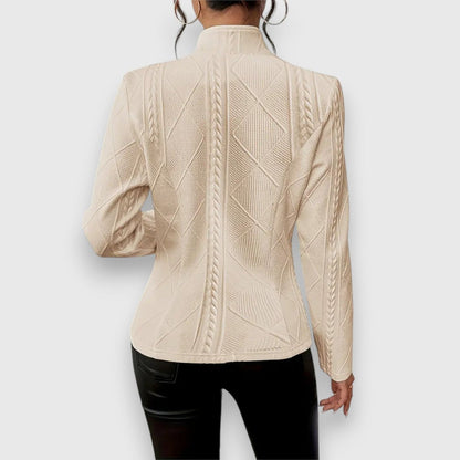Women’s textured knit cardigan with button front, collared neck, and long sleeves by Homixa, shown in a close-up view.