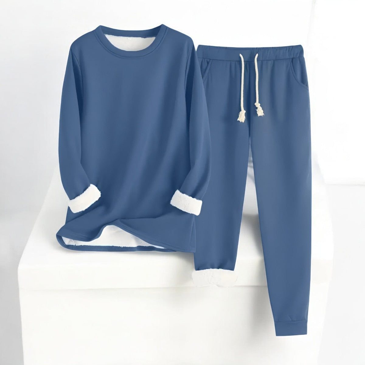 Women's thermal fleece two-piece set by Homixa featuring a cozy sweater and drawstring pants, perfect for cold weather comfort.