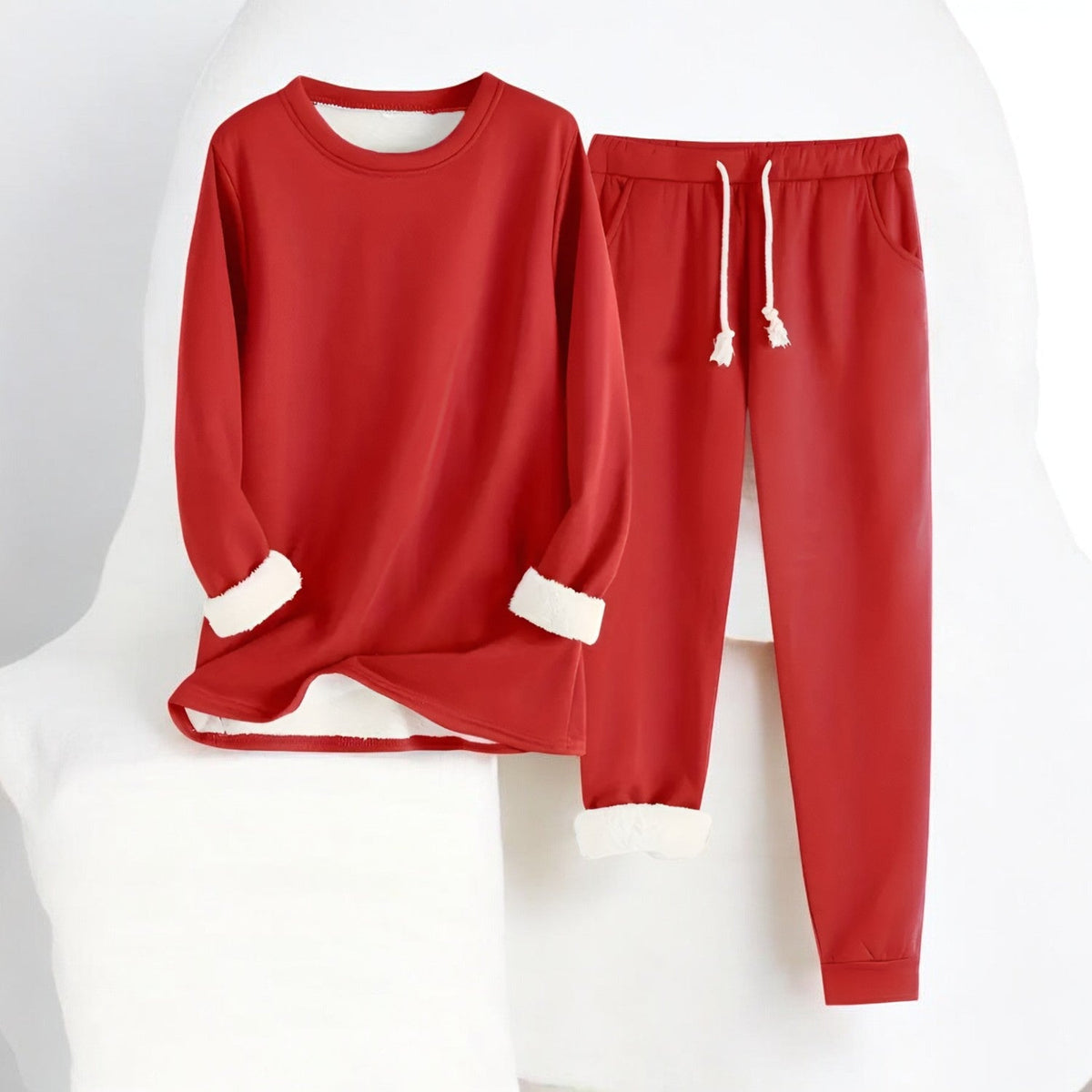 Women's thermal fleece two-piece set by Homixa, includes cozy sweater and drawstring pants for cold weather comfort.
