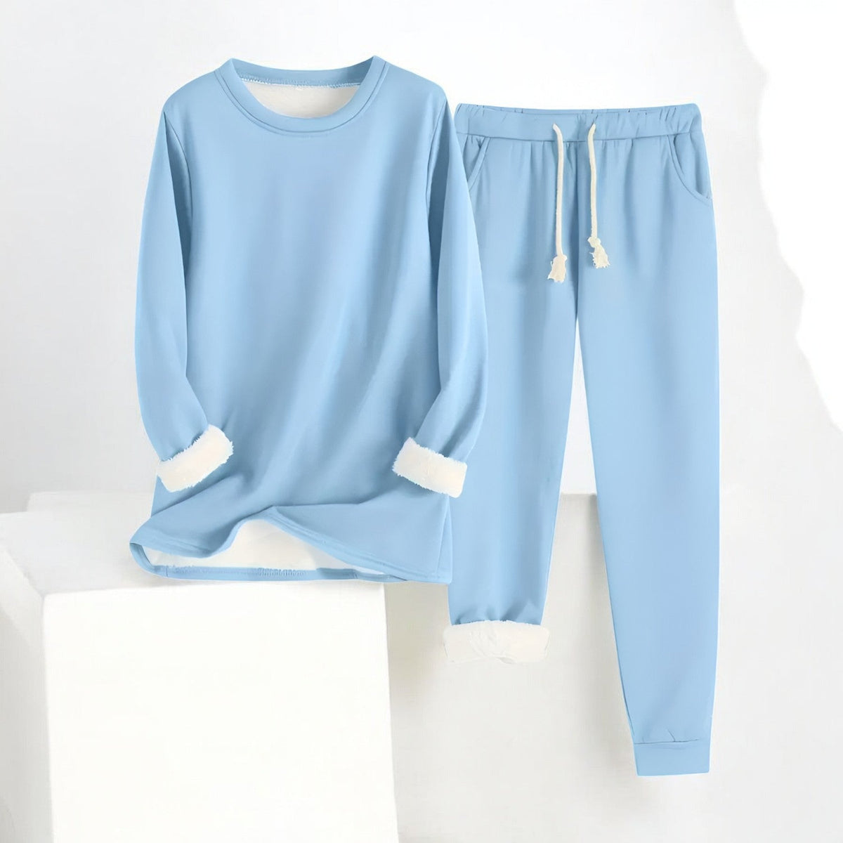 Women’s thermal fleece two-piece set by Homixa, includes cozy sweater and drawstring pants, ideal for cold weather.