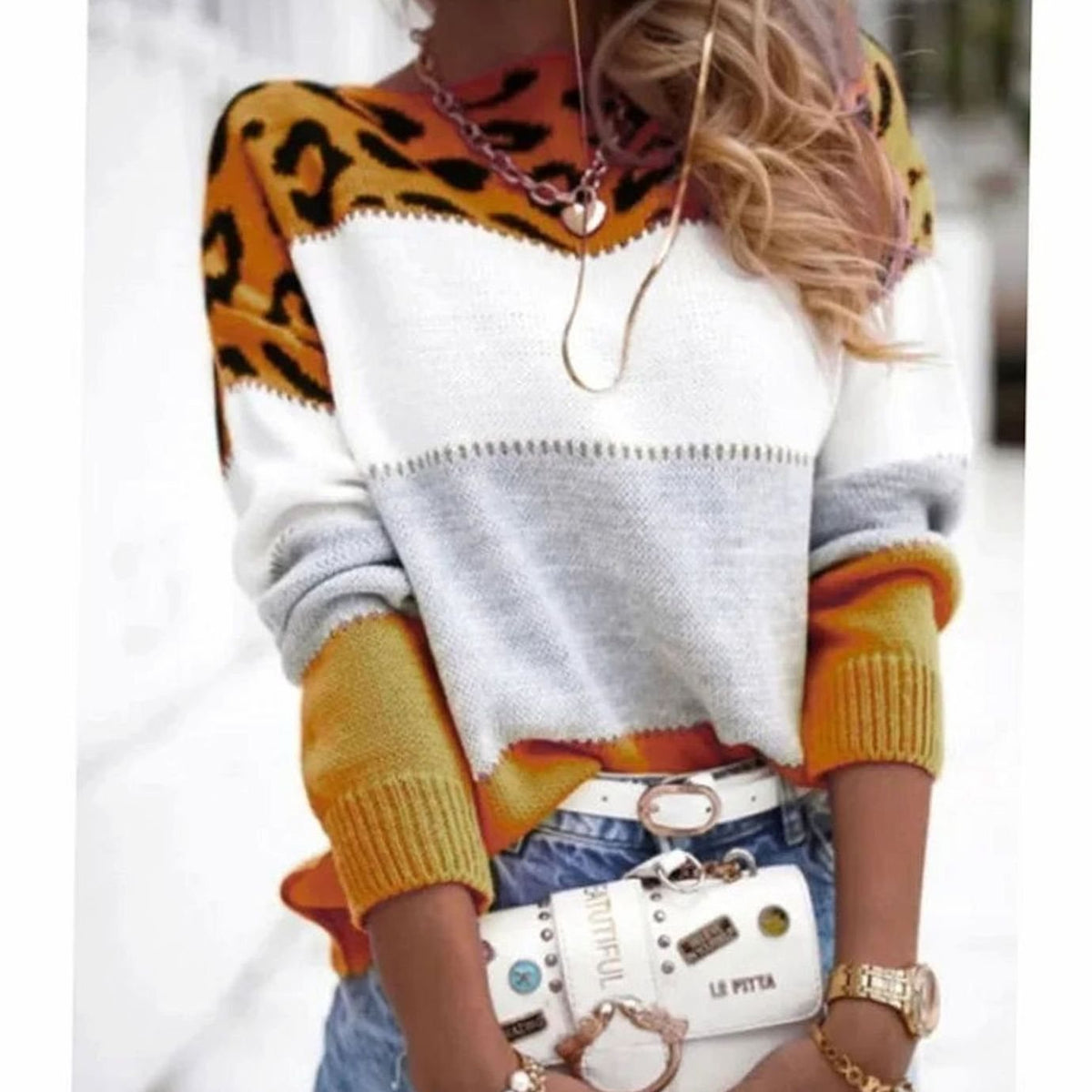 Women's cashmere blend turtleneck sweater with color-block leopard pattern by Homixa, showcasing the stylish and cozy design.