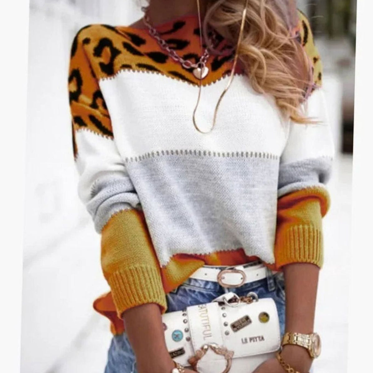 Women's cashmere blend turtleneck sweater with color-block leopard pattern by Homixa, featuring a cozy fit and stylish design.