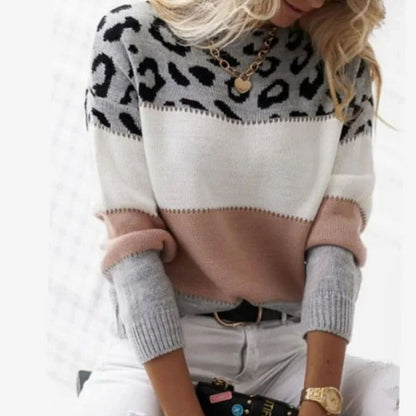 Women's cashmere blend turtleneck sweater with color-block leopard pattern by Homixa, showcasing stylish knitwear.