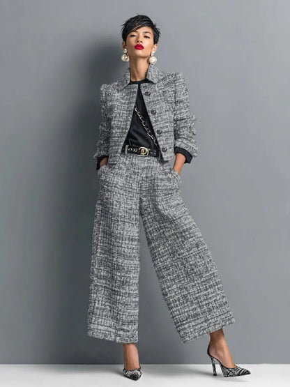 Women's Homixa tweed suit featuring a cropped blazer with structured shoulders and wide-leg trousers, stylish and tailored for professional wear.