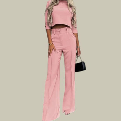 Homixa women's two-piece set with a mock-neck crop top and high-waist wide-leg pants featuring side pockets.