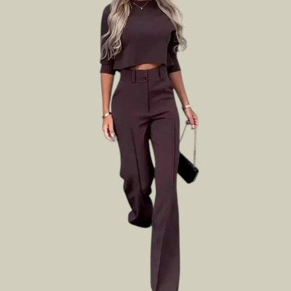Homixa women's two-piece set with a black mock-neck crop top and high-waist wide-leg pants with side pockets.