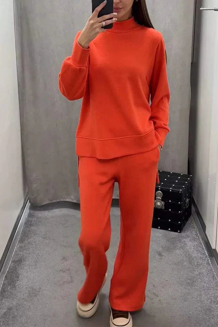 Women’s two-piece set featuring a high-neck sweater and wide-leg elastic waist pants by Homixa, displayed on a model.