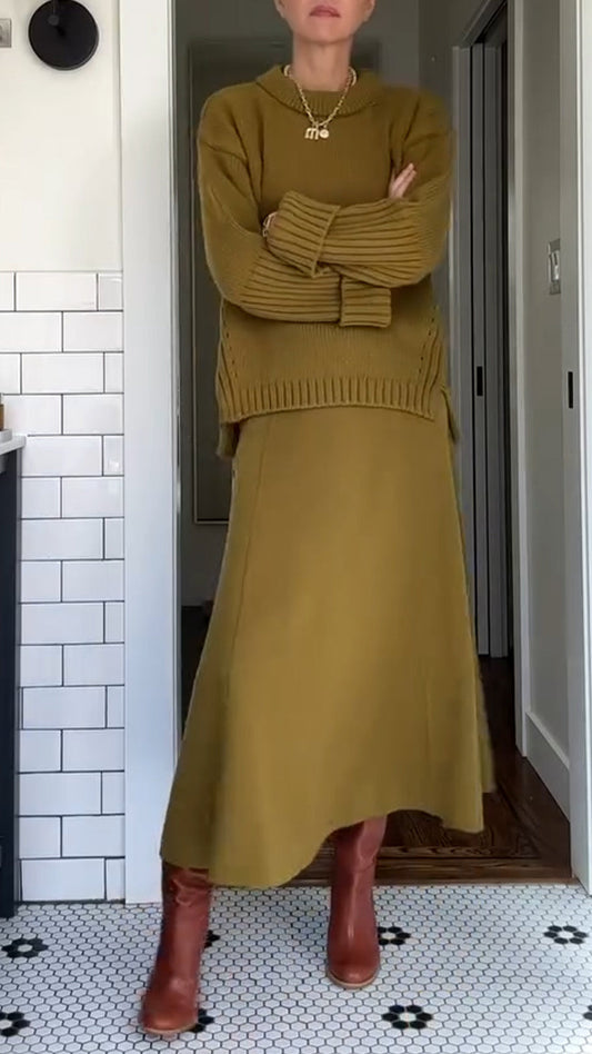 Women's two-piece set by Homixa featuring an oversized soft-knit sweater and a flowing maxi skirt, styled for casual wear.