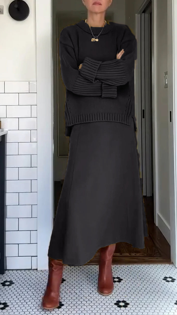 Women’s two-piece set by Homixa featuring an oversized soft-knit sweater and a flowing maxi skirt, perfect for casual comfort.