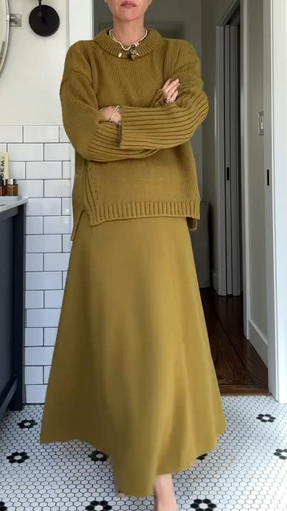 Women's two-piece set by Homixa featuring an oversized soft-knit sweater and a flowing maxi skirt, ideal for casual wear.