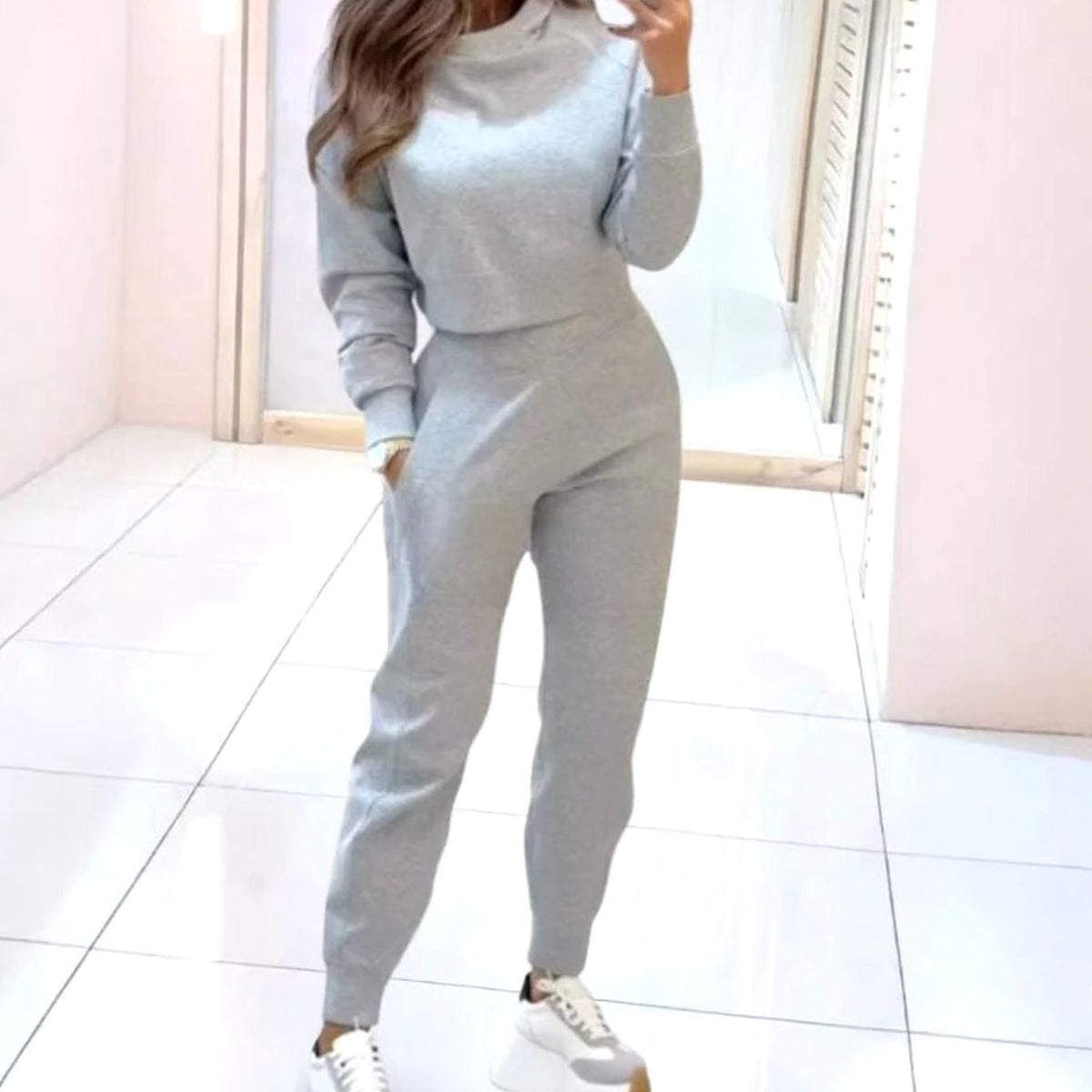 Homixa women's two-piece track suit with cropped crew-neck sweater and high-waist joggers, casual athletic wear for women.
