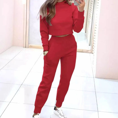 Homixa women's two-piece track suit with a cropped crew-neck sweater and high-waist joggers, stylish activewear set.